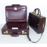 Three similar brown leather brief/camera accessories cases