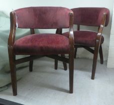 A pair of mid 20thC stained beech framed and red fabric upholstered open arm reception chairs,