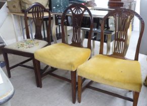 Three dissimilar early 20thC mahogany framed dining chairs