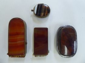 A late 19thC Scottish white metal and multi-coloured banded agate vesta case with a hinged cap and