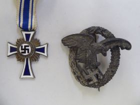 German military collectables: to include a World War II mother's cross with ribbon (Please Note: