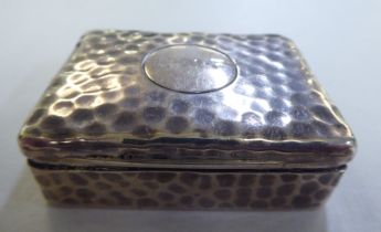 A late Victorian spot-hammered silver box with straight sides and a hinged lid  London 1896