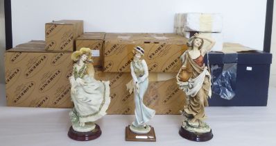 A collection of Giuseppe Armani 'Florence of Italy' porcelain figures  approx 10"h  boxed