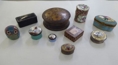 Antique trinket boxes: to include a white metal and painted enamel patch box; and a black