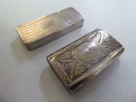 An early Victorian silver vesta case with engine turned decoration and a double hinged access