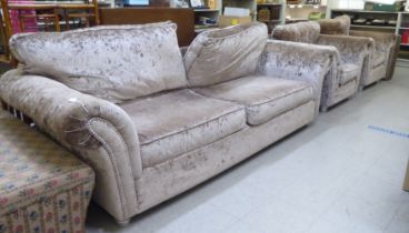 A modern four piece suite, upholstered in silvered effect, shimmer crushed velvet  comprising a