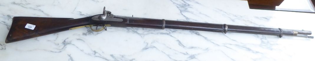 A mid/late 19thC percussion musket  bears a crown emblem and AP initials