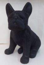 A black textured composition model, a seated dog  18"h