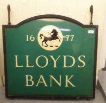 A cast iron and enamelled shop sign 'Lloyds Bank'  29"h  27"w