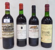 Four bottles of wine, viz. a 1982 Chateau Du Cauze; a 1986 Chateau Le Domainede Bouche; a 1983