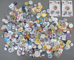 A miscellaneous collection of printed tinplate and other badges: to include a Spice Girls set of