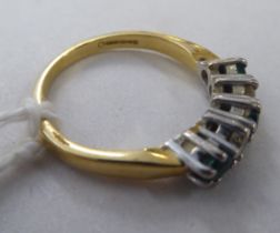 An 18ct gold, diamond and emerald ring
