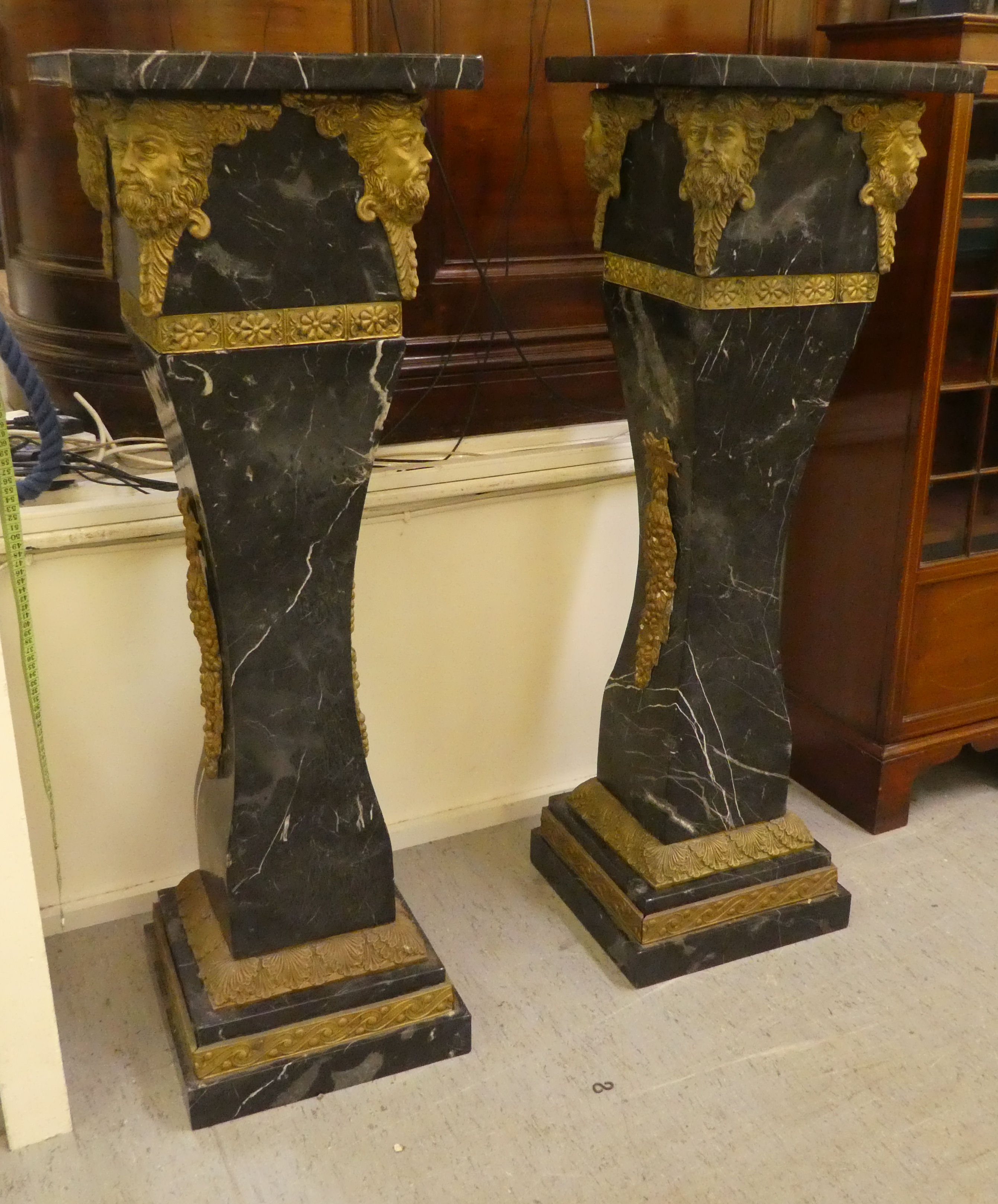 A pair of 19thC Continentally inspired, modular, marble pedestals of square, tapered form with