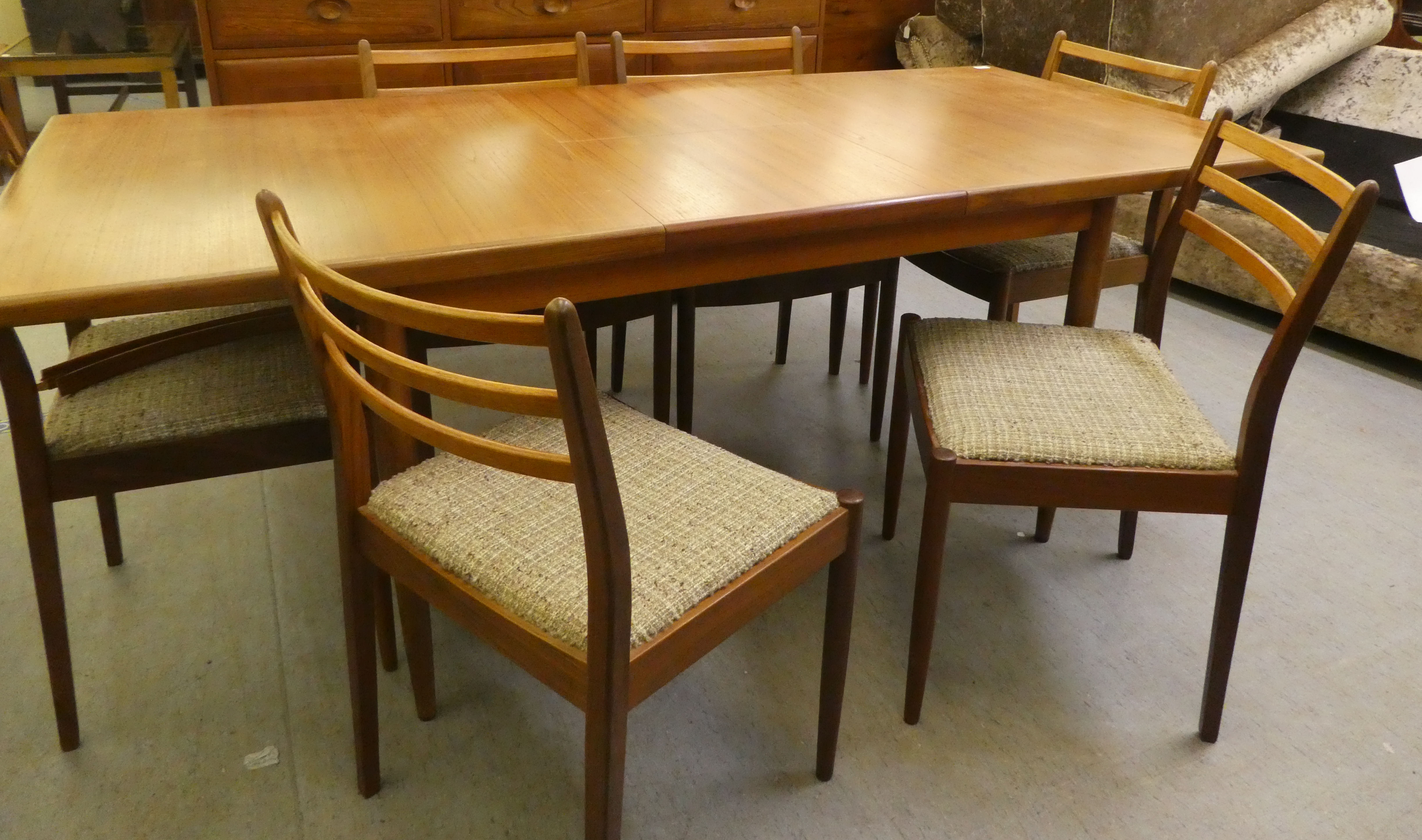 A 1970s teak G-Plan dining table, raised on turned, tapered legs  29"h  62"L extending to 80"L - Image 6 of 8