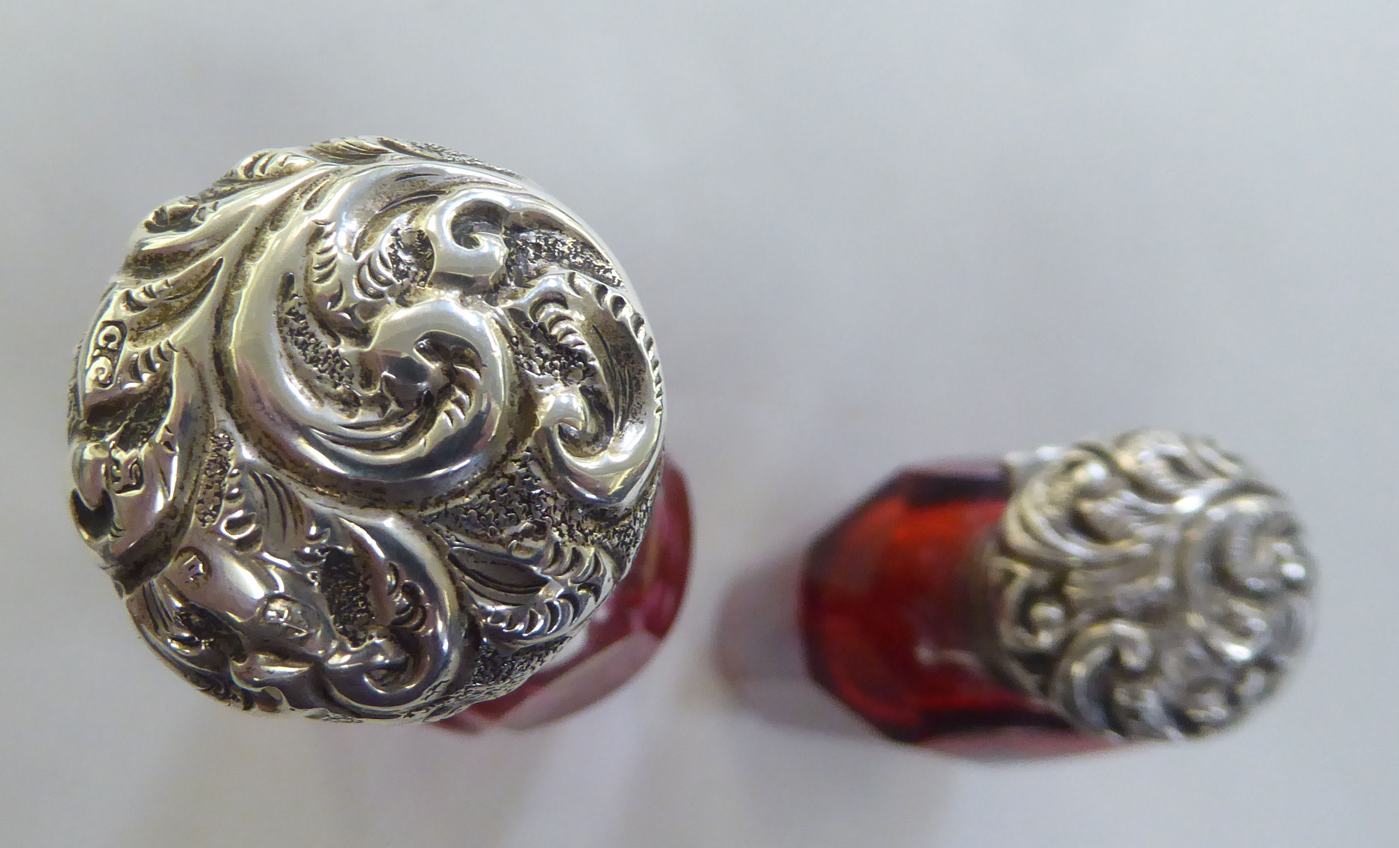 Two late Victorian Cranberry glass scent bottles, each with a hinged silver lid  indistinct marks - Image 2 of 2