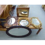 Five dissimilar 20thC mirrors: to include a reproduction of a Regency convex example  16"dia