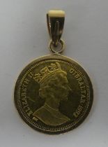 An Elizabeth II Gibraltar coin, in a pendant mount