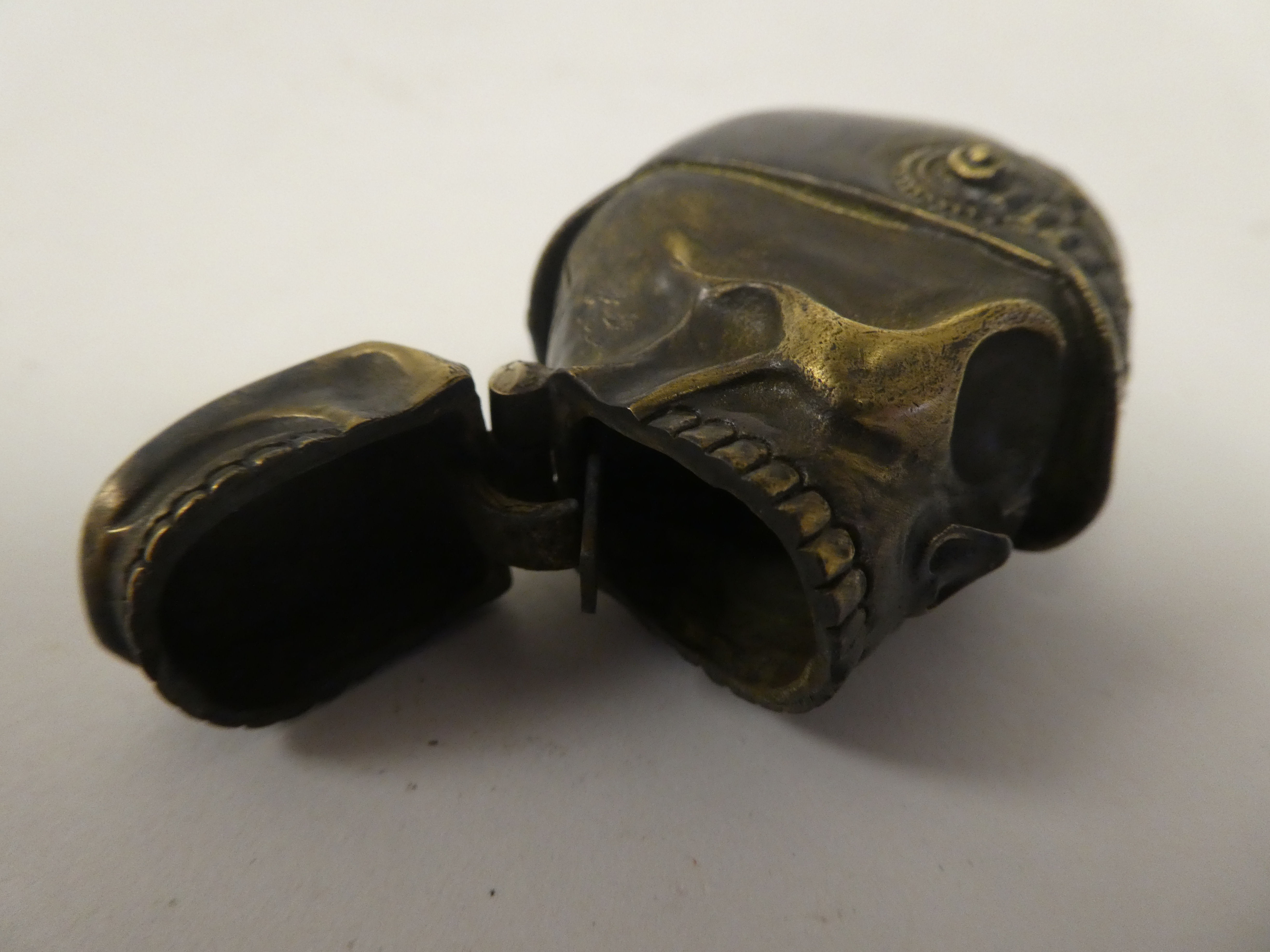 A brass vesta case, fashioned as a skull wearing a pickelhaube - Image 5 of 5