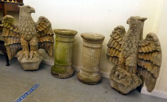 A pair of late 1950s composition stone grotesque birds on separate stone columns  69"h  32"wingspan,