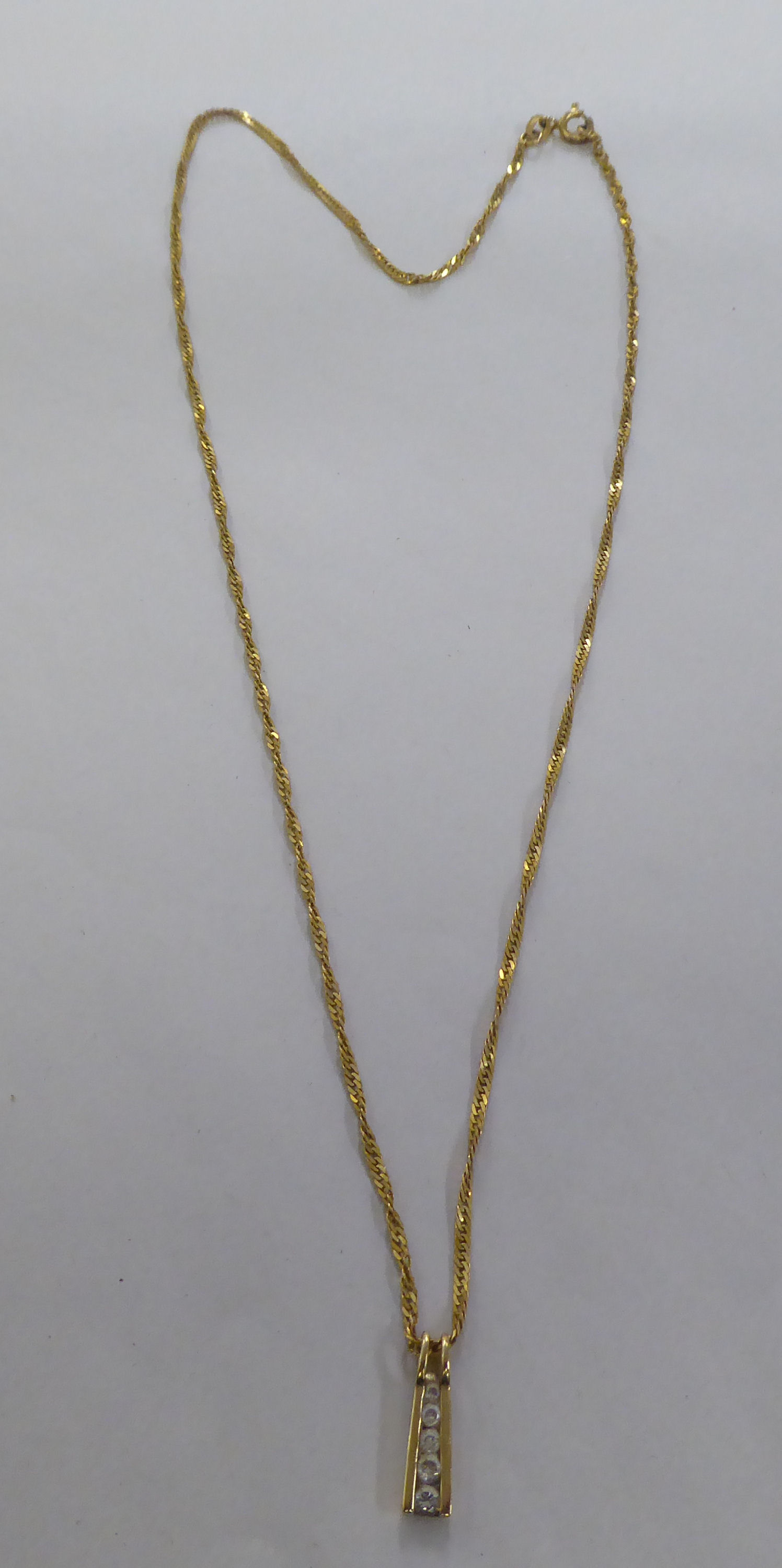 A 9ct gold pendant necklace, set with white stones - Image 2 of 3