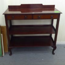 An Edwardian three tier buffet with two drawers, raised on cabriole legs  42"h  46"w