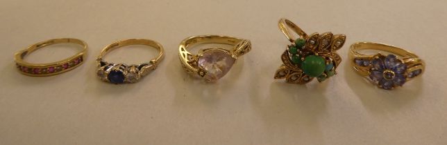 Five 9ct gold rings, variously set with coloured stones