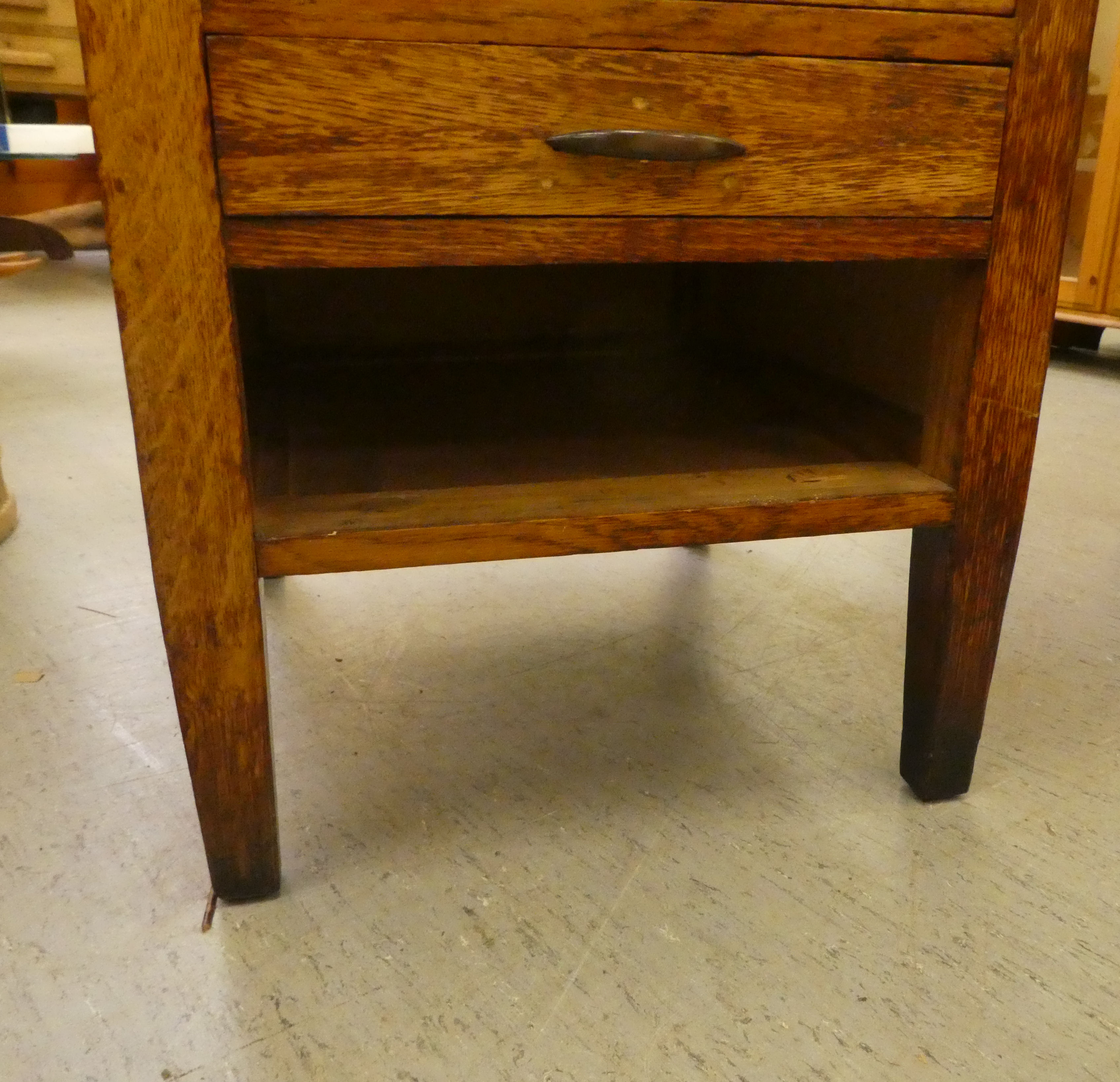 A modern oak single pedestal desk with four drawers, raised on block legs  29"h  42"w - Image 5 of 5