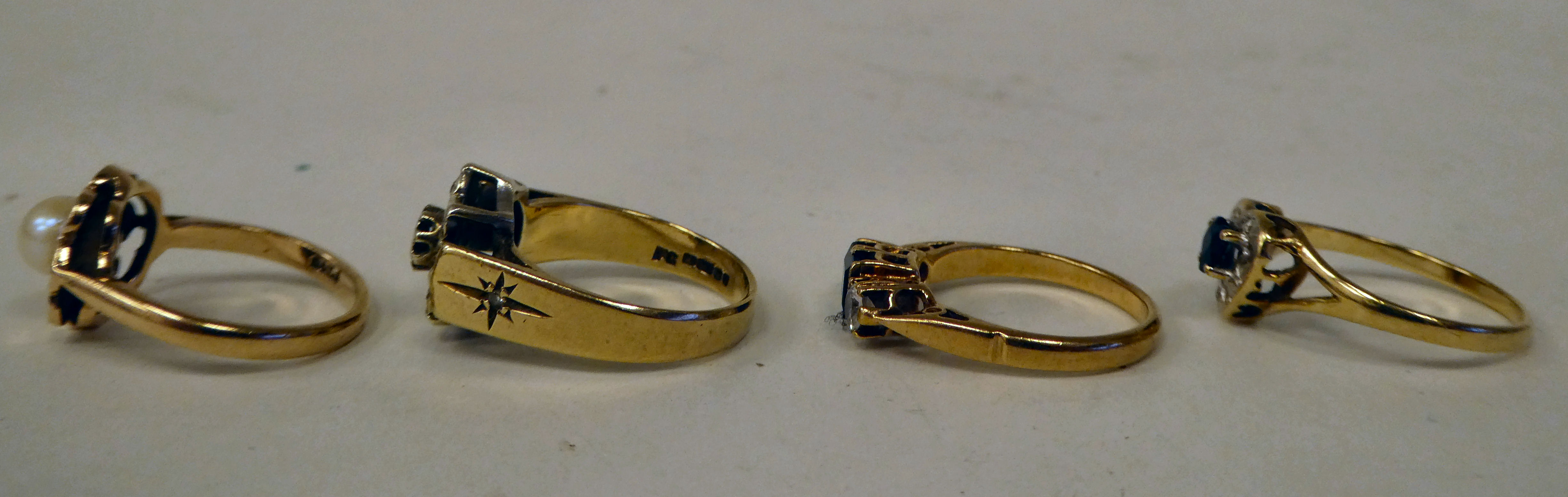 Four variously designed, 9ct gold rings: to include one set with a single pearl - Image 2 of 3