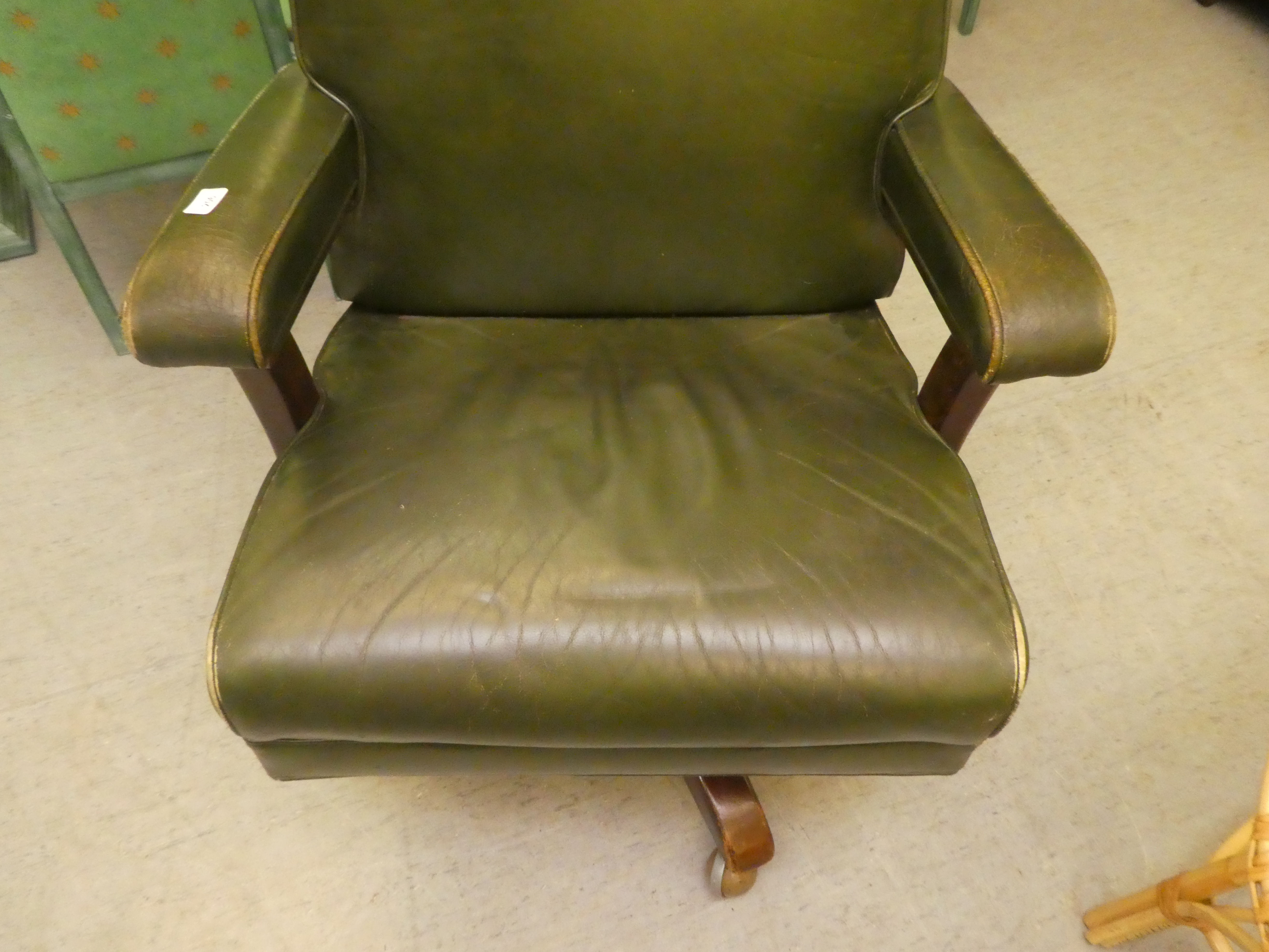 A mid 20thC faux green hide upholstered swivel office chair, raised on a splayed pedestal base - Image 2 of 5