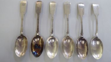 A set of six silver fiddle pattern dessert spoons  London 1900