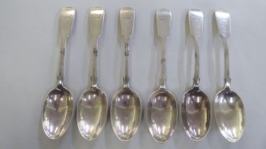 A set of six silver fiddle pattern dessert spoons  London 1900