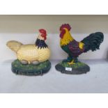 Two cast iron door porters, a chicken  11"h; and a cockerel  12"h