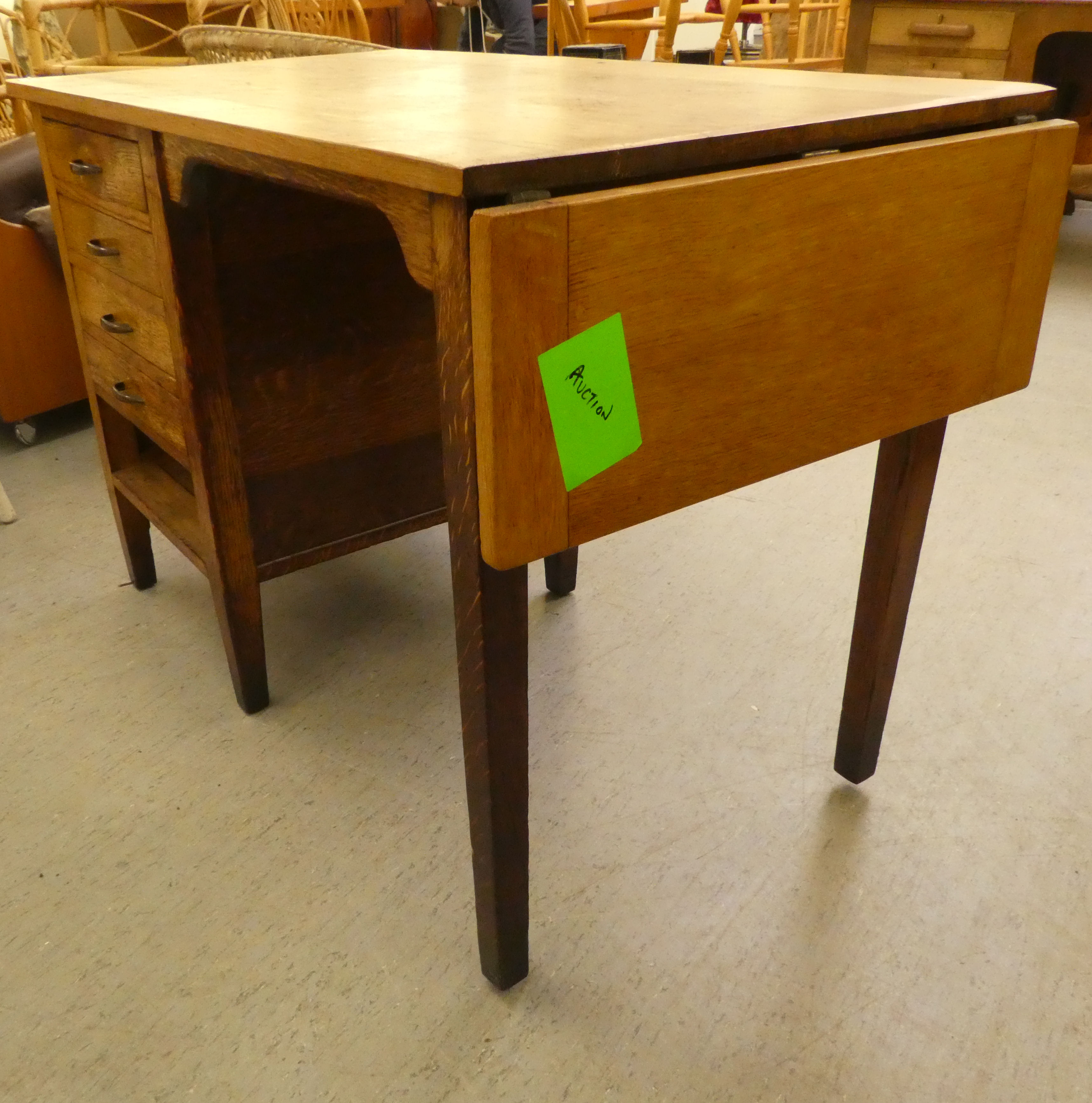 A modern oak single pedestal desk with four drawers, raised on block legs  29"h  42"w - Image 3 of 5