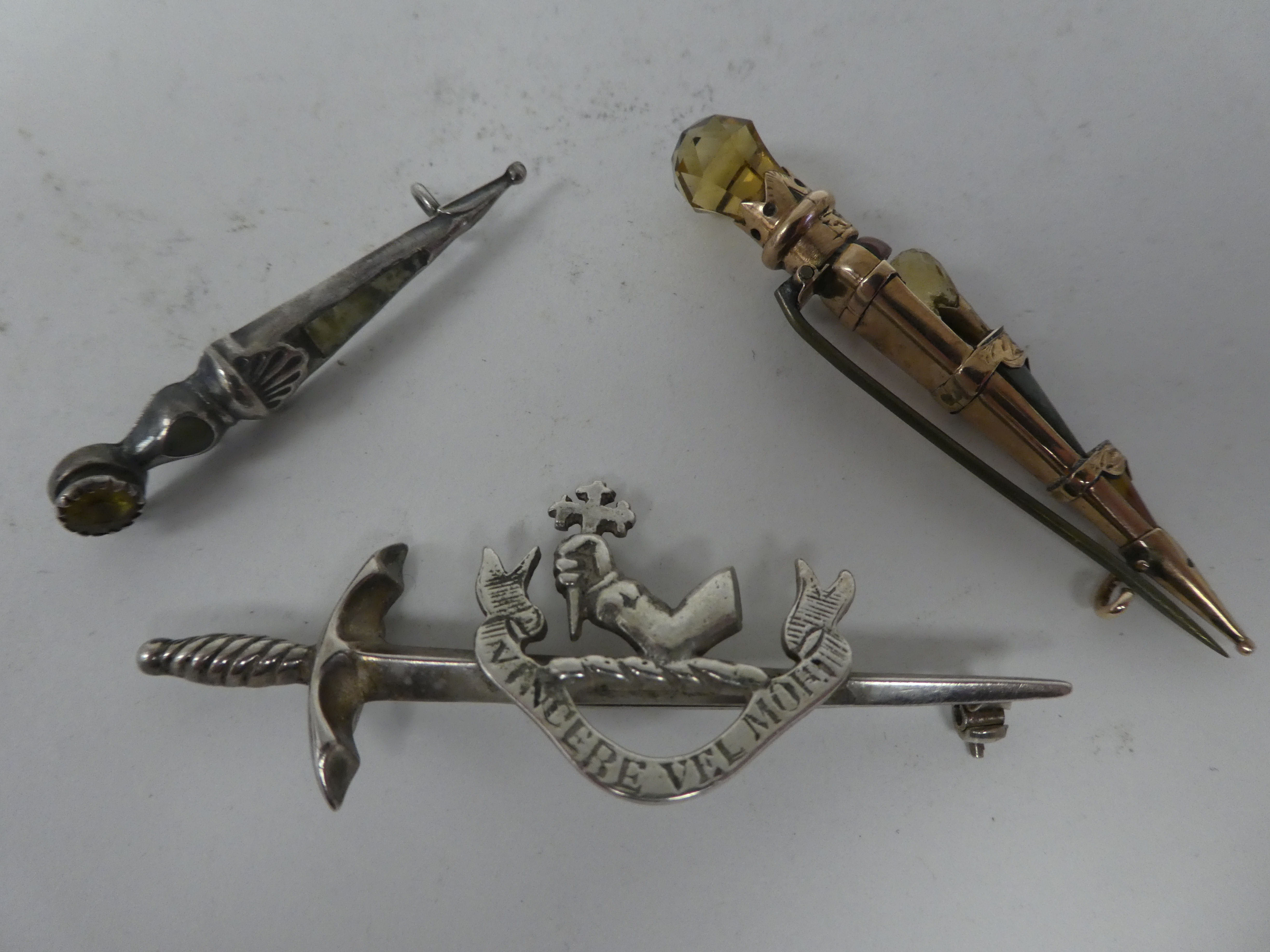 Scottish pin brooches: to include Sterling and other silver and yellow metal sword brooches - Image 10 of 12