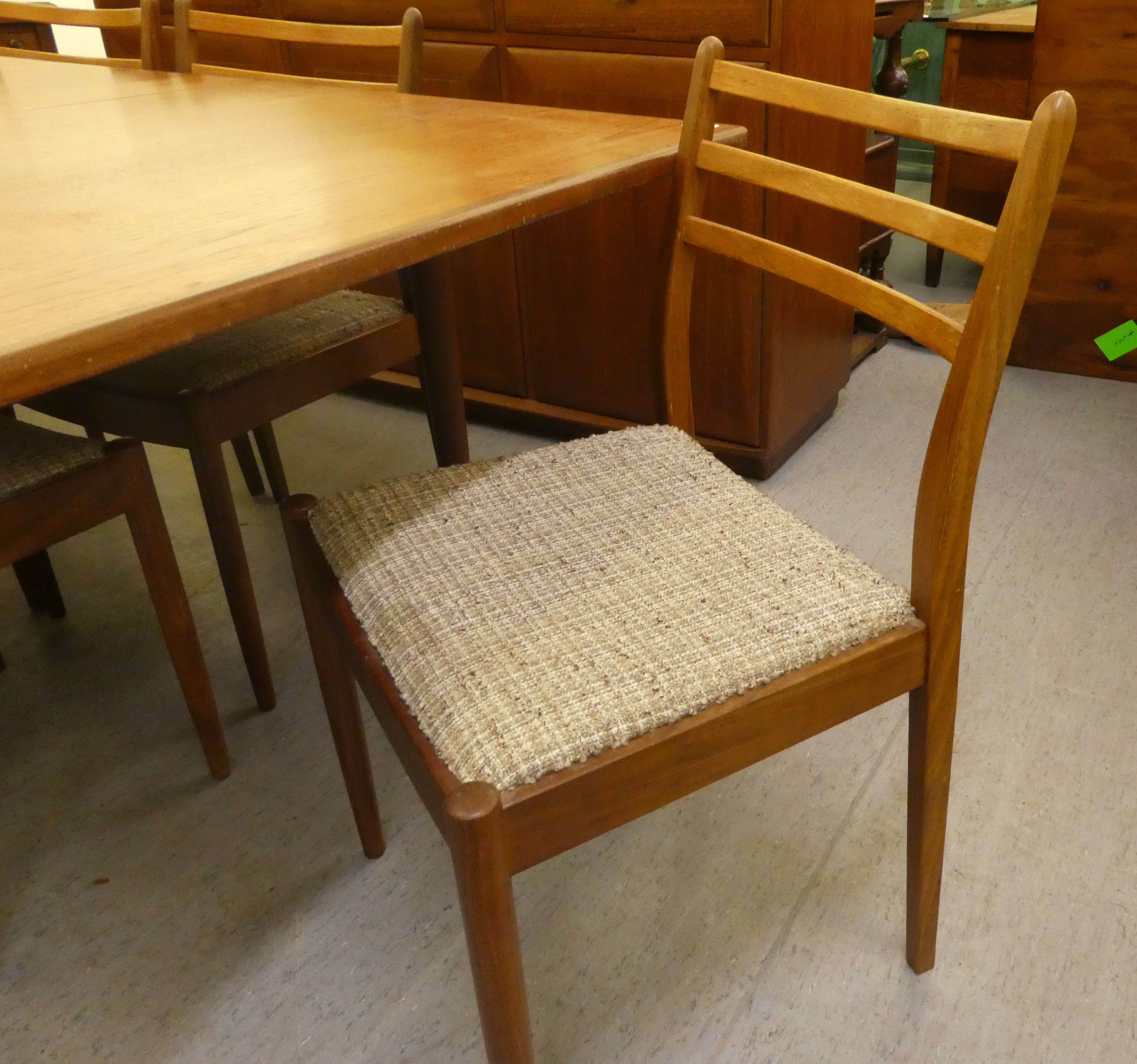 A 1970s teak G-Plan dining table, raised on turned, tapered legs  29"h  62"L extending to 80"L - Image 4 of 8