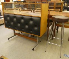 A 1960s laminate bar with a glazed upper section, raised on metal legs  38"h  42"w