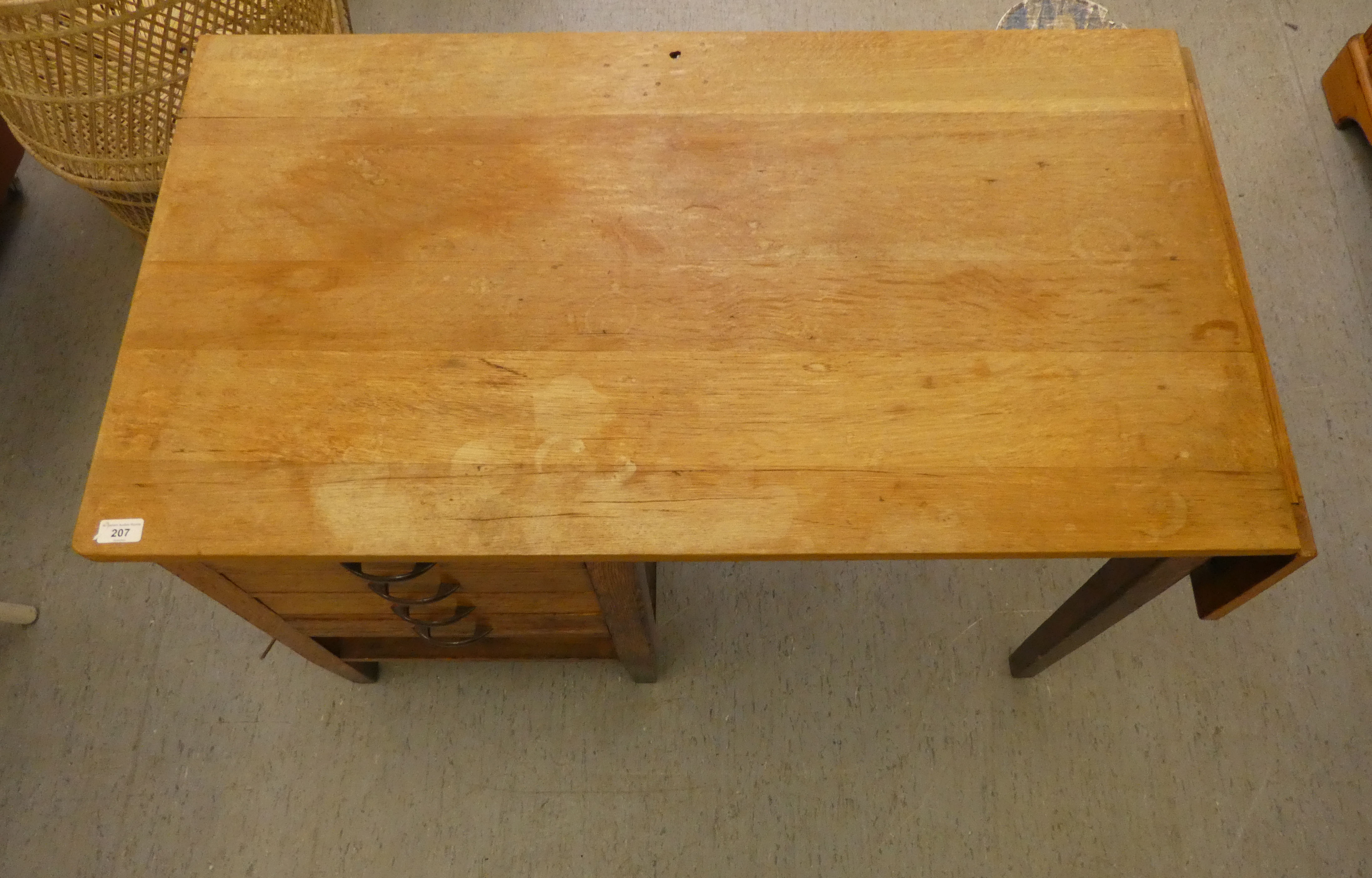 A modern oak single pedestal desk with four drawers, raised on block legs  29"h  42"w - Image 2 of 5