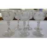 A set of six pedestal wine glasses, engraved with fruiting vine  5.5"h