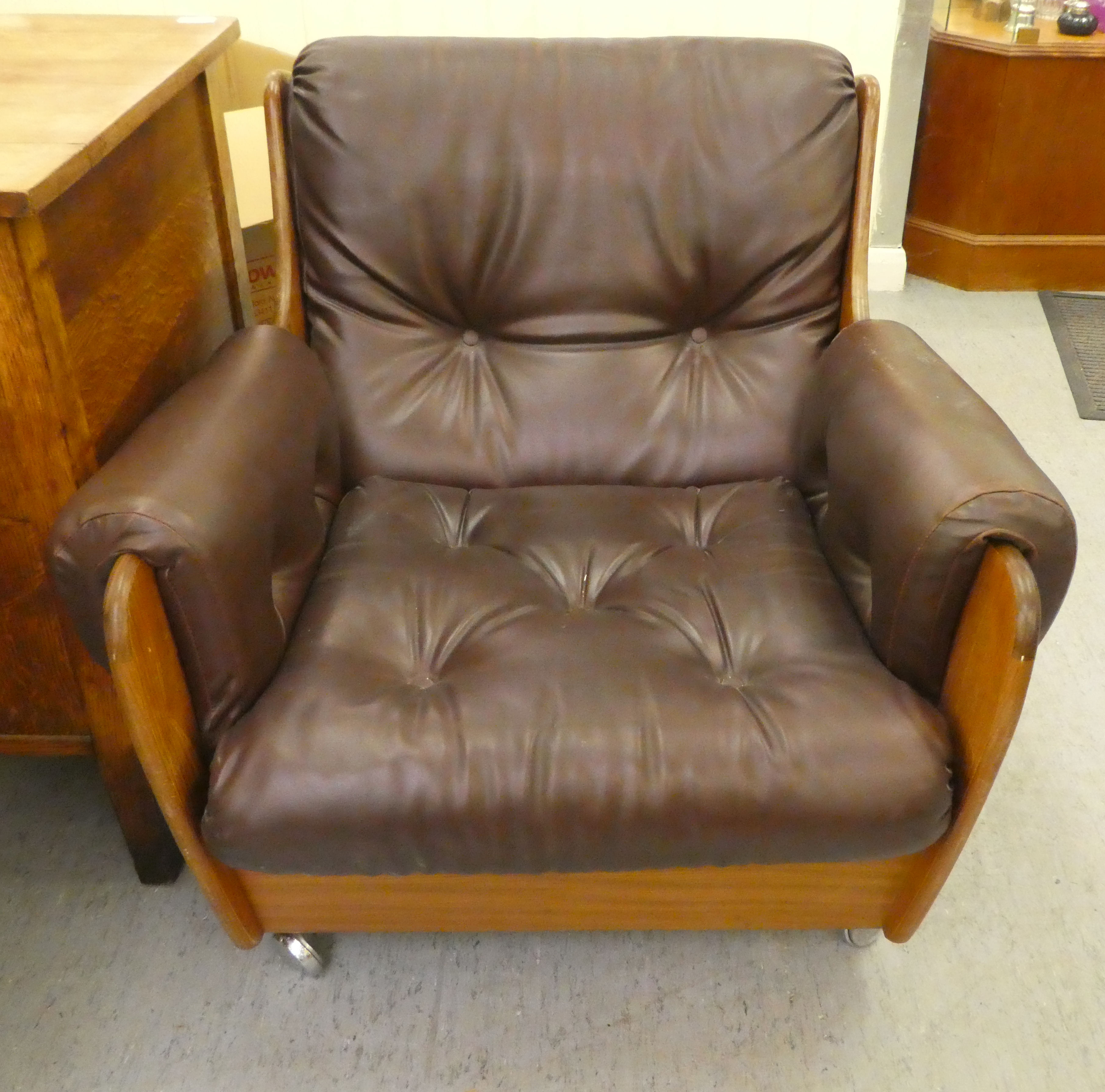 A 1960/70s G-Plan teak framed easy chair with a faux brown hide upholstered back and seat - Image 2 of 4