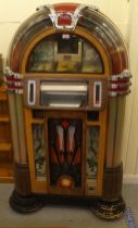 An American design wood finished compact disc juke box  60"h  33"w