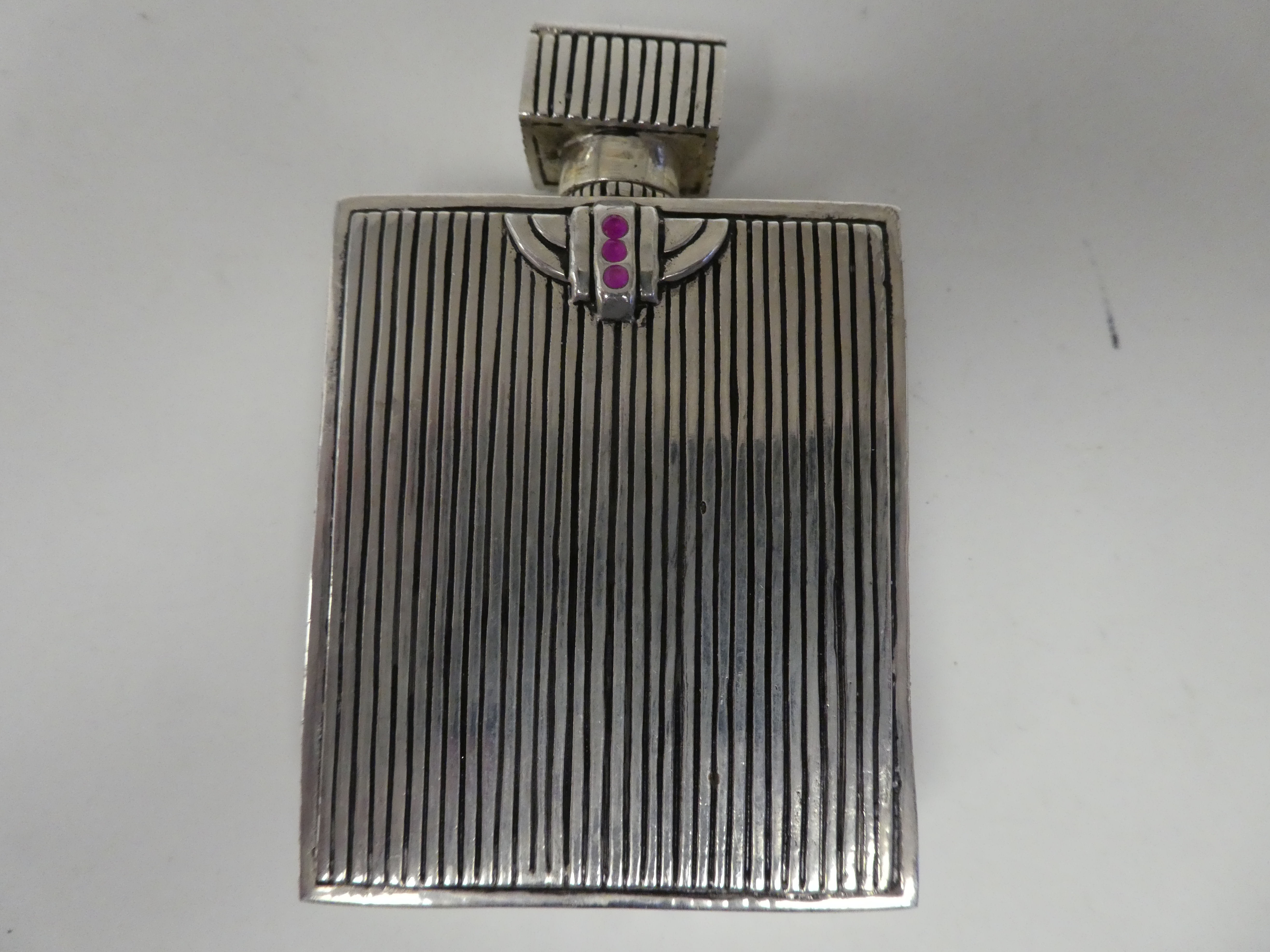 An Art Deco inspired white metal perfume bottle, decorated with an enamelled study of a posing nude - Image 2 of 4