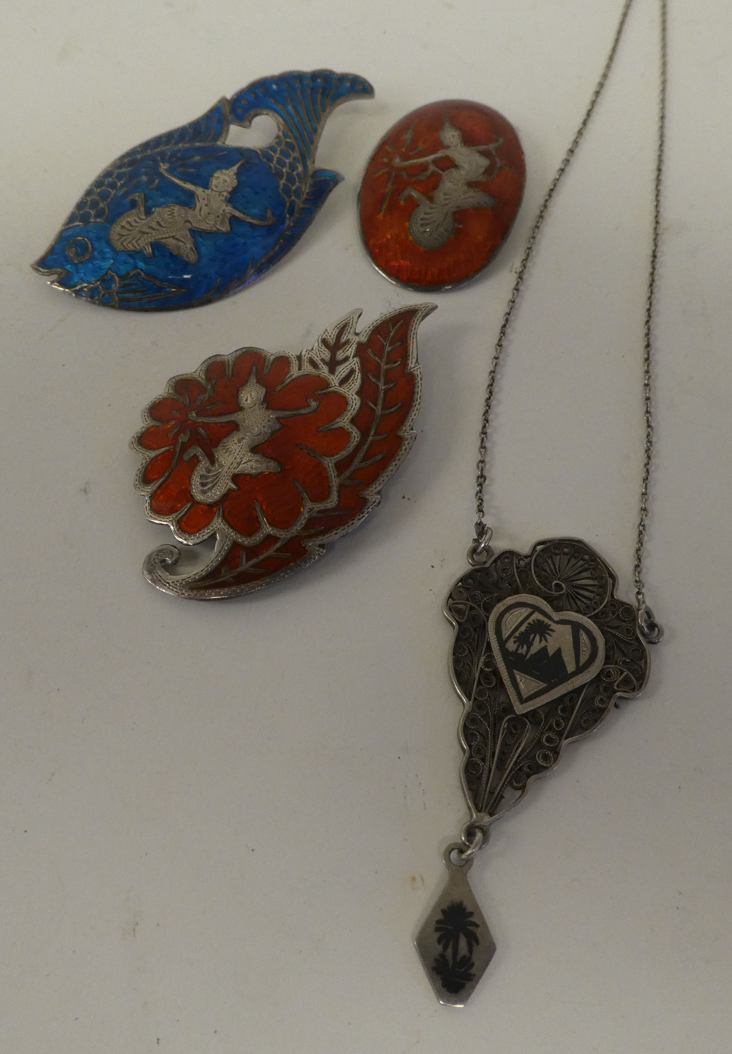 Asian silver, silver coloured metal and enamelled items of personal ornament: to include brooches; a - Image 9 of 9