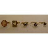 Five 9ct gold rings, variously set with coloured stones