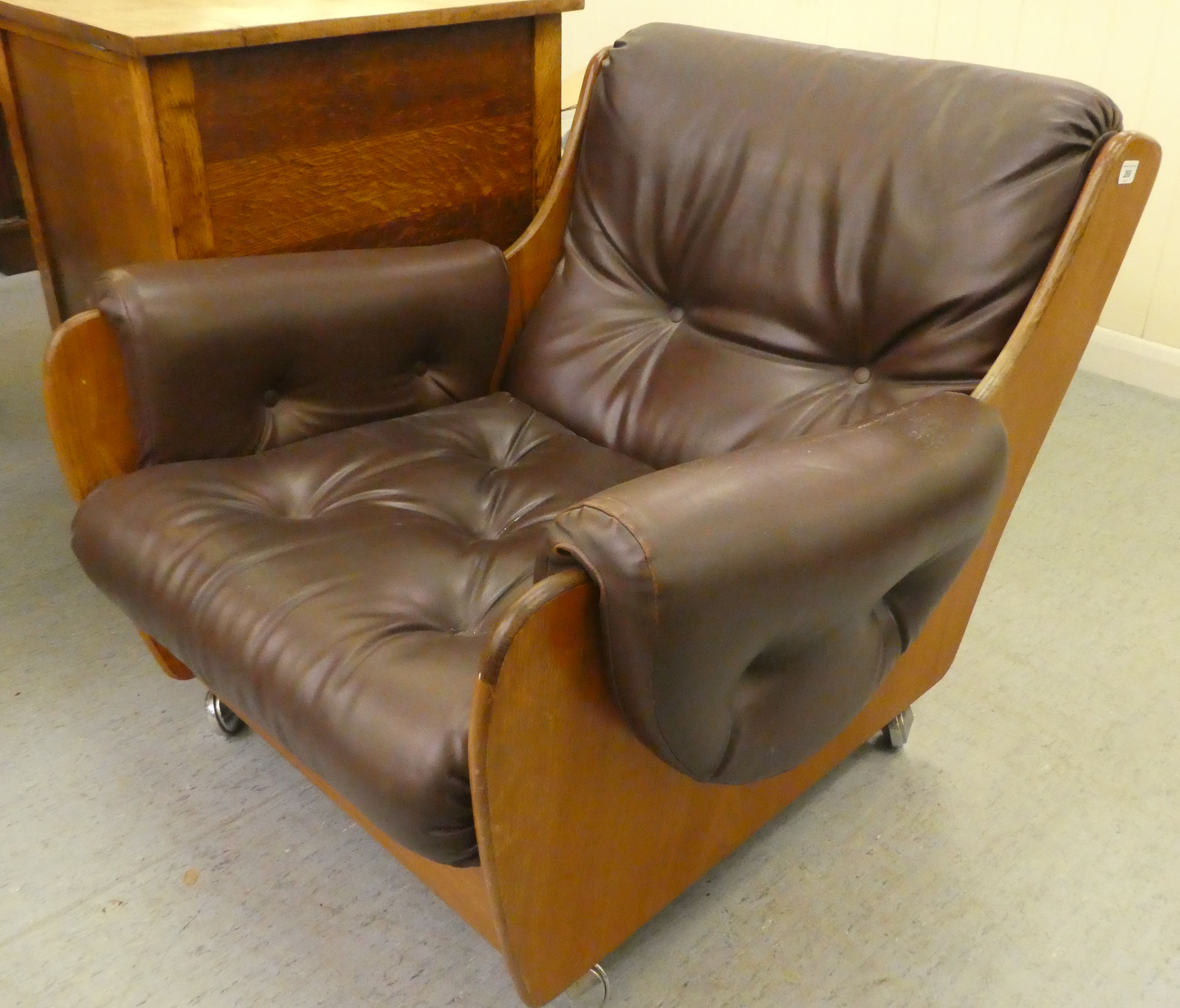 A 1960/70s G-Plan teak framed easy chair with a faux brown hide upholstered back and seat - Image 3 of 4