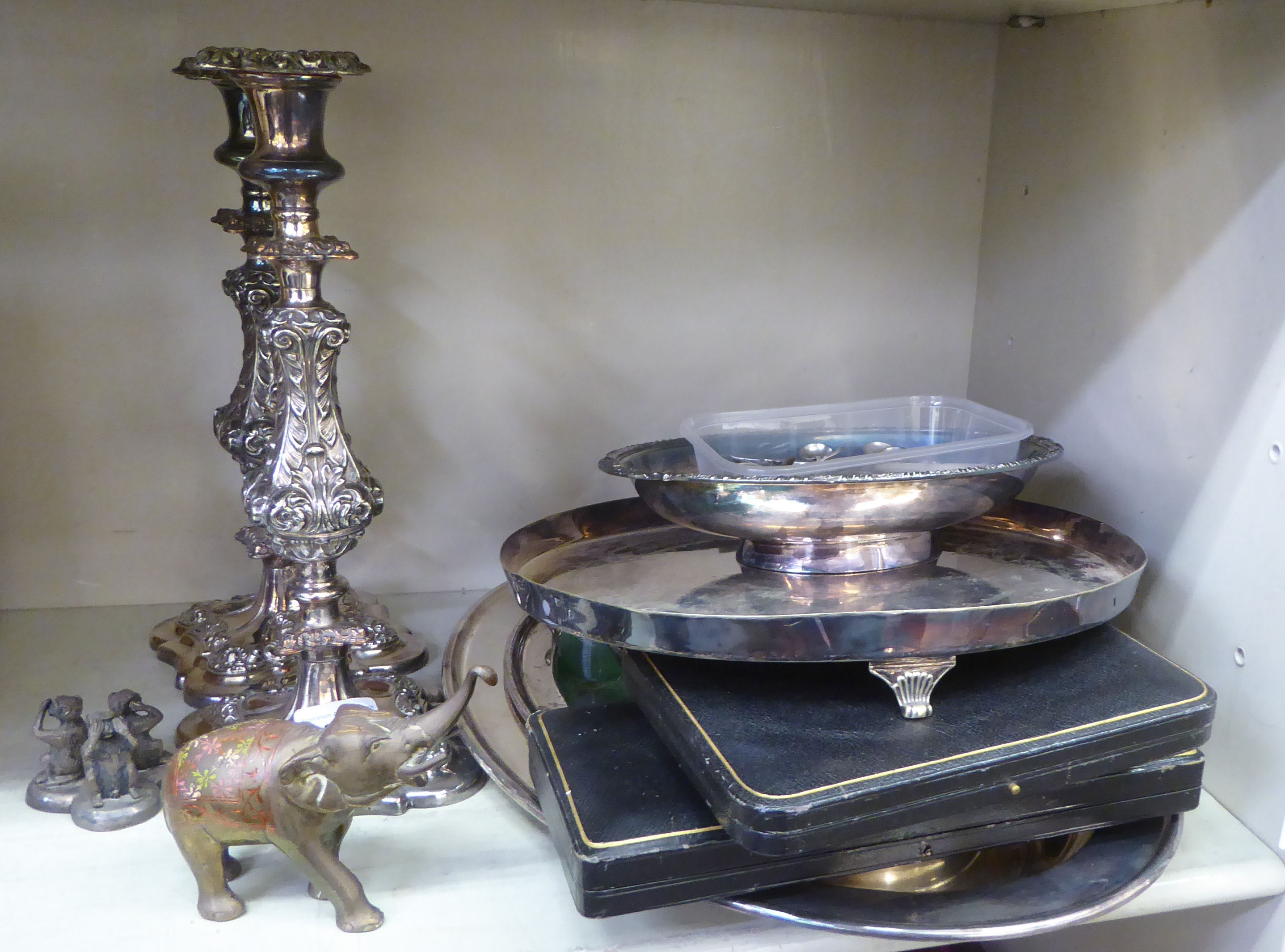 Metalware: to include a pair of silver plated candlesticks, embossed with swags  8"h