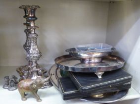 Metalware: to include a pair of silver plated candlesticks, embossed with swags  8"h