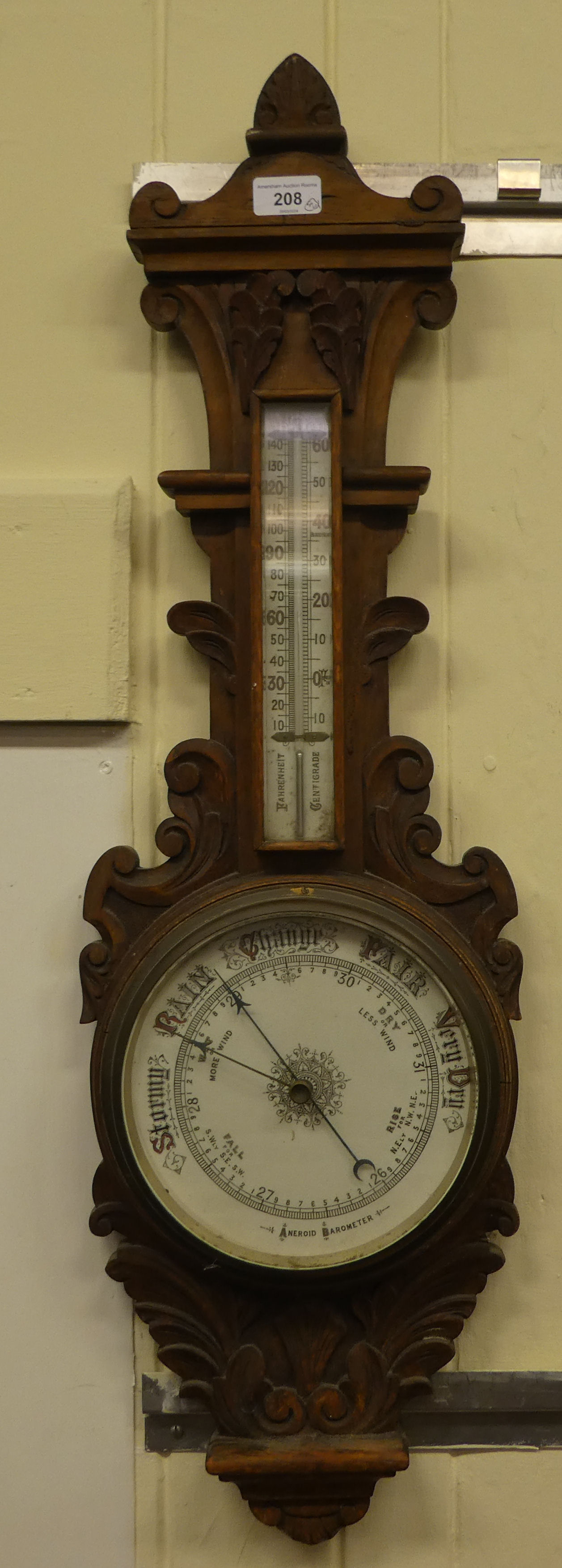 A mixed lot: to include an Edwardian oak barometer with a Roman and Arabic dial  34"h
