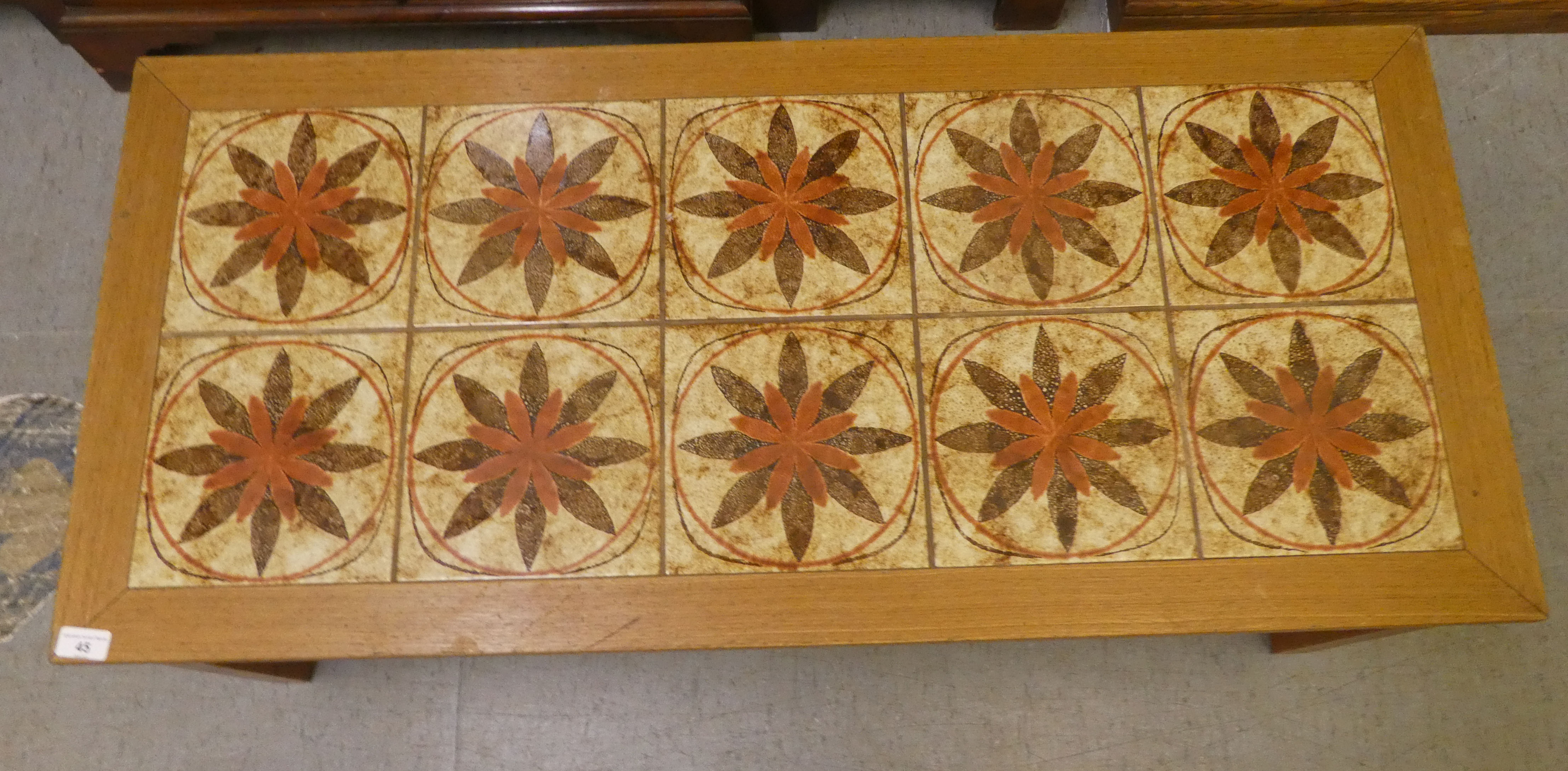 A 1970s teak framed ten tile top coffee table, raised on square legs  17"h  46"w - Image 2 of 4