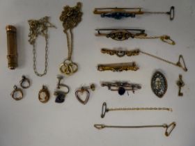 Yellow and gold coloured metal items of personal ornament: to include bar brooches