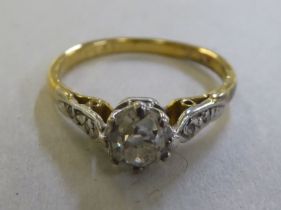 An 18ct gold and platinum diamond solitaire ring